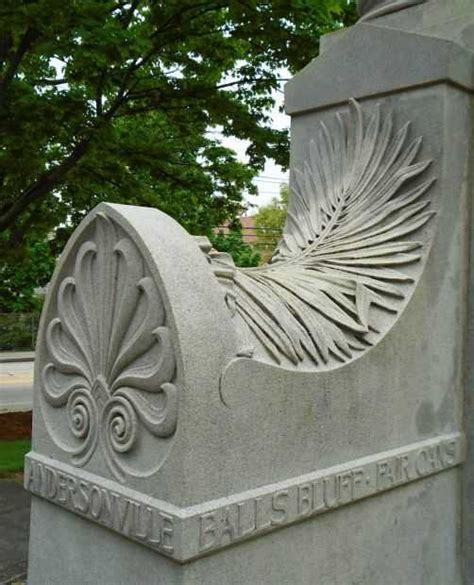 Stone civic monument among trees